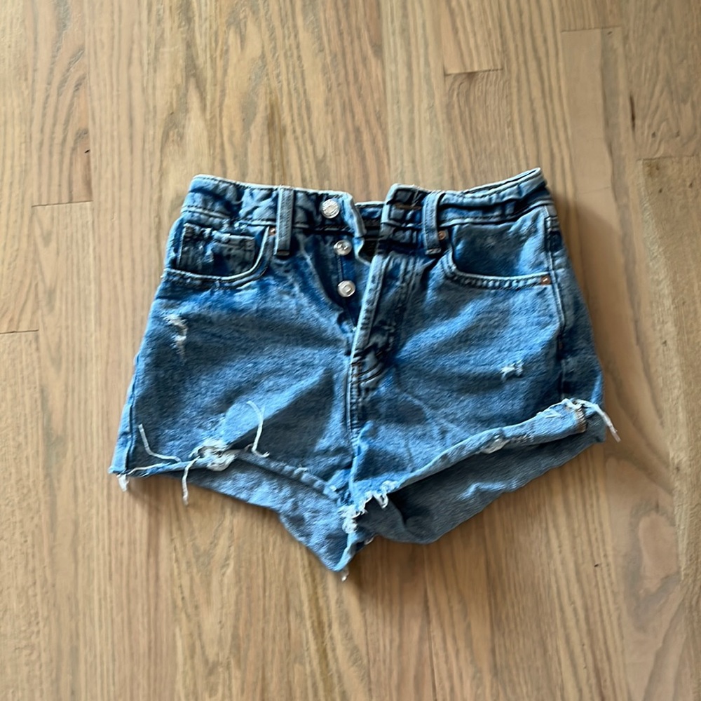 Cute dark blue slightly ripped jean shorts